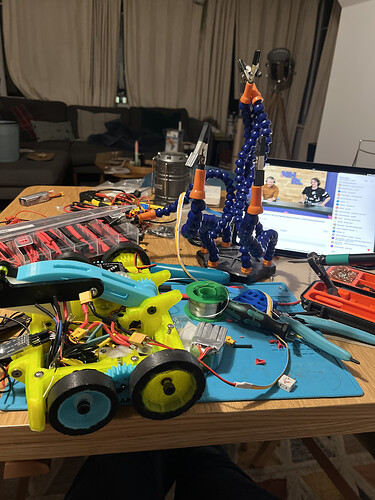 Building robots while watching robots